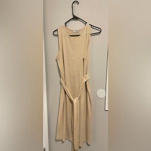Tight fitting tan dress